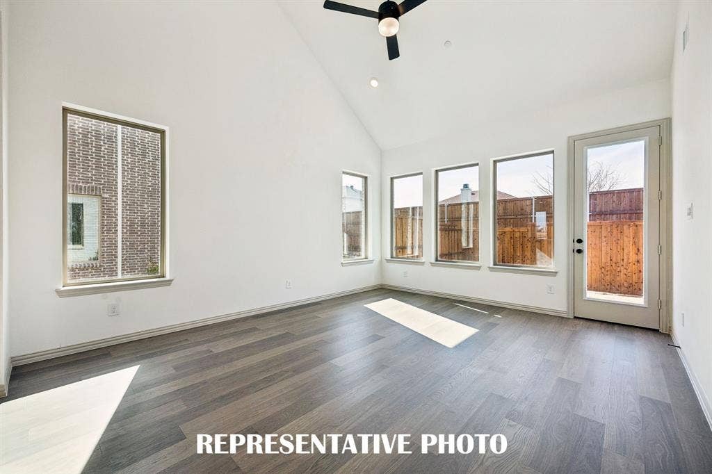 3567 Pierce Lane, Grand Prairie, TX 75052 You'll enjoy a spacious family room flooded with natural light in our Walker floor plan. REPRESENTATIVE PHOTO