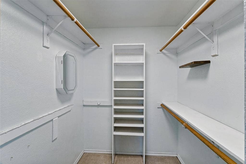 4667 Heatherbrook Lane, Grand Prairie, TX 75052 There is a large walk in closet in the primary berdroom.