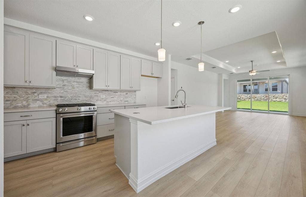 205 Snowbird Way, McKinney, TX 75071 *Floorplan representation, not actual home - Large island gathering room and dining areas overlooking
