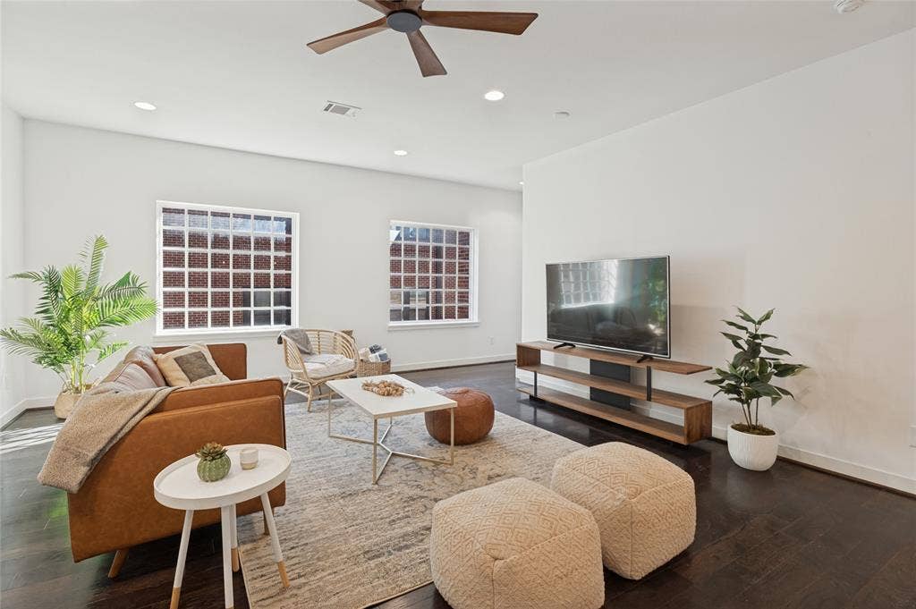 614 Finley Court, Dallas, TX 75208 Dark wood-finish flooring, recessed lighting, grid-pattern windows, and a ceiling fan