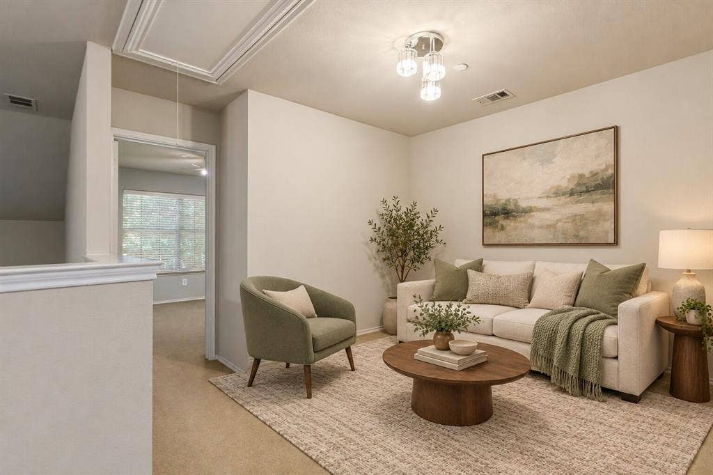 Neutral walls, multi-light flush-mount ceiling fixture, and carpeted flooring