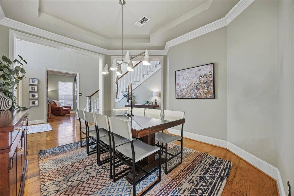 Formal dining- gorgeous and the West Elm fixture is the star of the show