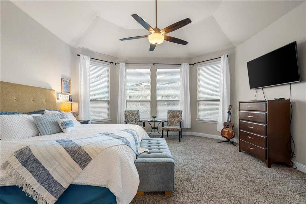 Primary Bedroom with abundant lighting