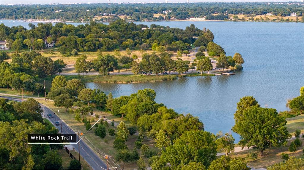 6979 Bob O Link Drive, Dallas, TX 75214 Aerial perspective featuring extensive lake frontage, mature tree canopy, and access to White Rock Trail