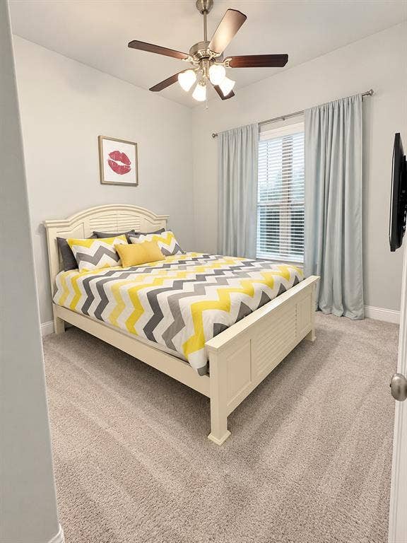 301 Delaford Drive, Forney, TX 75126 Comfortable bedroom with a ceiling fan and soft natural light.