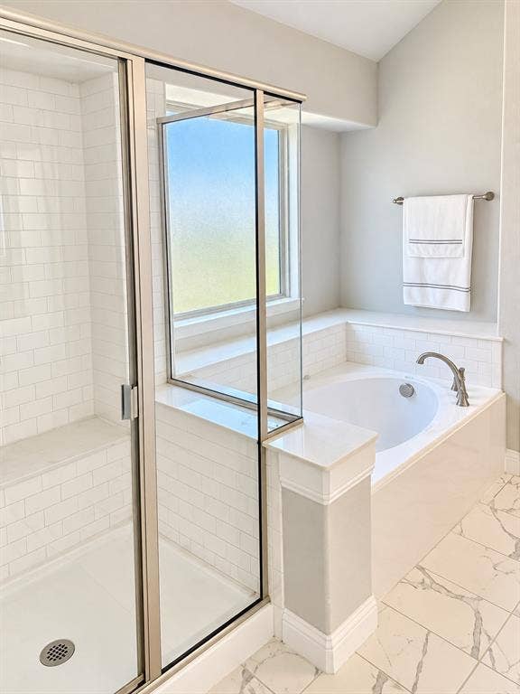 301 Delaford Drive, Forney, TX 75126 Primary bath features a soaking tub and a separate glass-enclosed shower.