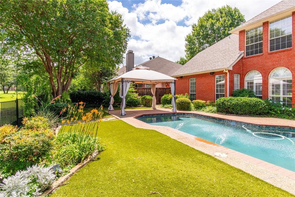 12004 Paducah Drive, Frisco, TX 75035 Expansive backyard with pool and room to play, garden or entertain.