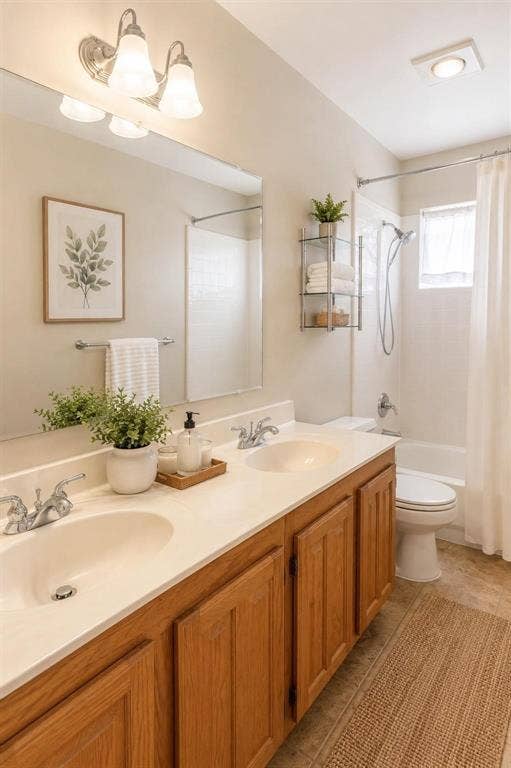 12004 Paducah Drive, Frisco, TX 75035 Updated bath with warm wood cabinetry, generous counter space and bright finishes.