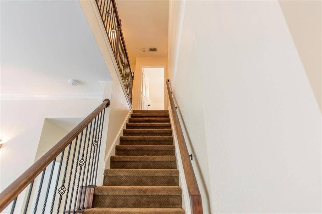 12004 Paducah Drive, Frisco, TX 75035 Staircase leads upstairs to three secondary bedrooms and the oversized game room.