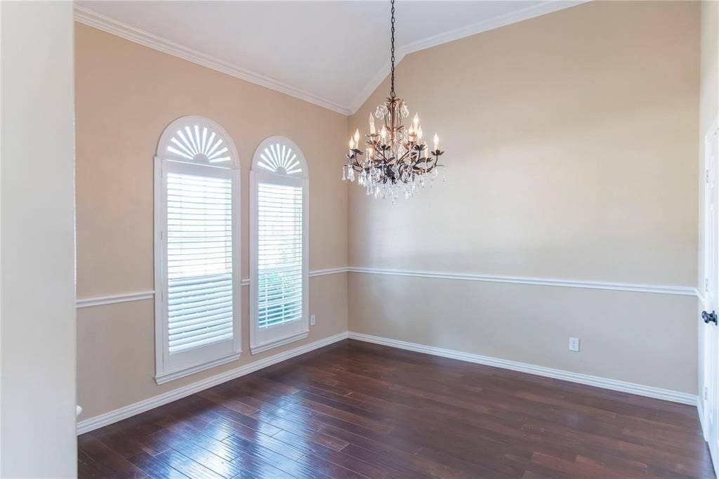 12004 Paducah Drive, Frisco, TX 75035 Formal dining or flex space with arched windows, chandelier and wood floors.