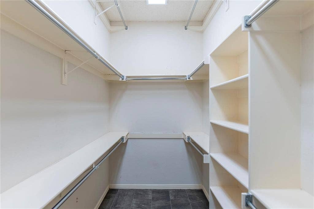 12004 Paducah Drive, Frisco, TX 75035 Generous walk-in closet with built-in shelving - storage for days!