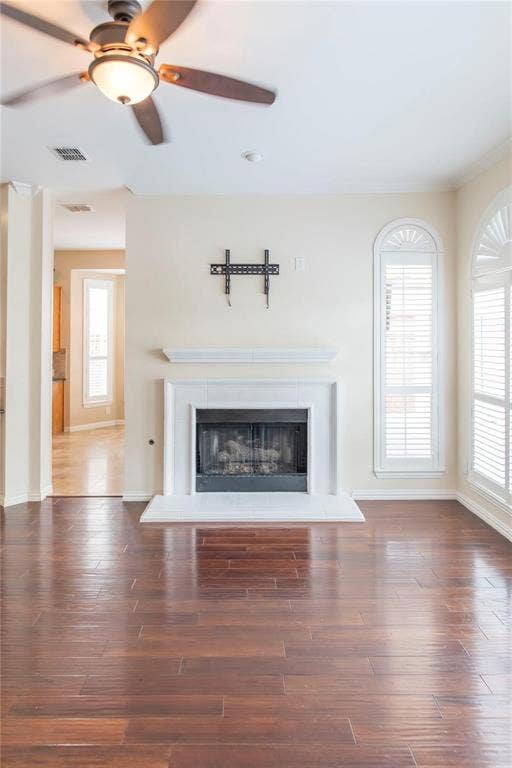 12004 Paducah Drive, Frisco, TX 75035 Cozy fireplace and high ceilings make this living space warm and welcoming.