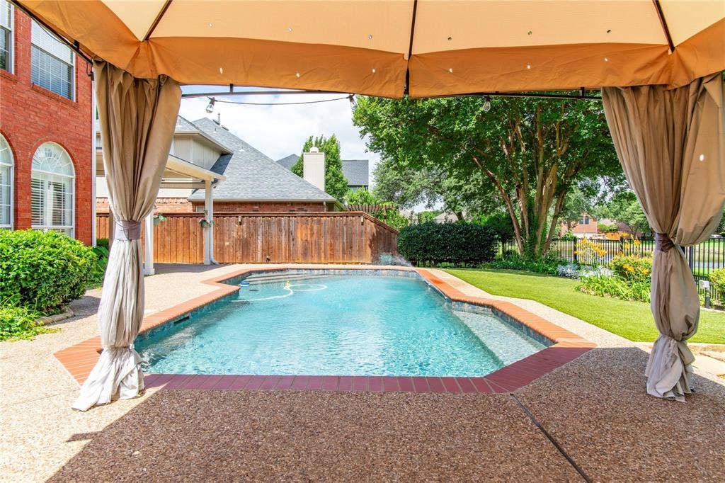 12004 Paducah Drive, Frisco, TX 75035 Shaded cabana overlooking the pool - your private backyard escape.
