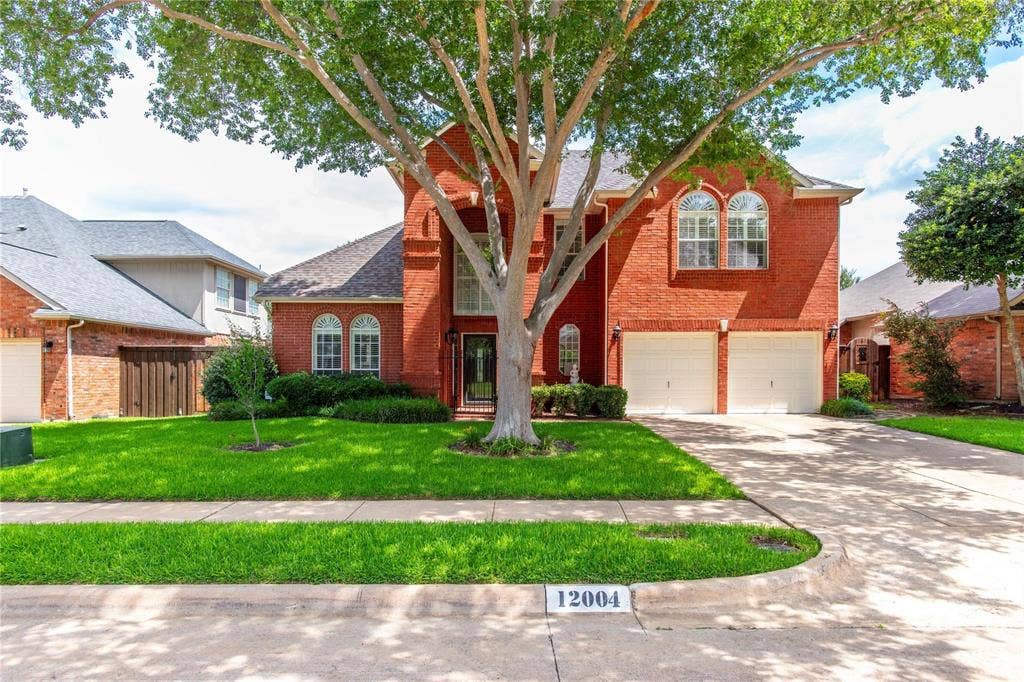 12004 Paducah Drive, Frisco, TX 75035 Stunning curb appeal! Timeless brick two-story with mature shade trees, manicured lawn and attached garage.