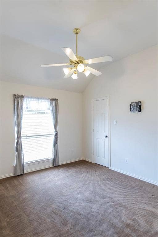 12004 Paducah Drive, Frisco, TX 75035 Comfortable bedroom with plush carpet and ceiling fan - plenty of space for furnishings.