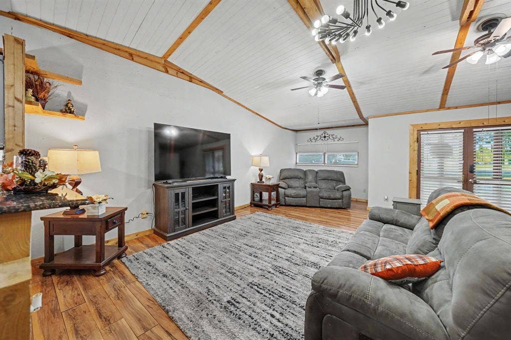 2415 Fannin Street, Greenville, TX 75401 Spacious living room with an open floorplan that flows seamlessly into the kitchen.
