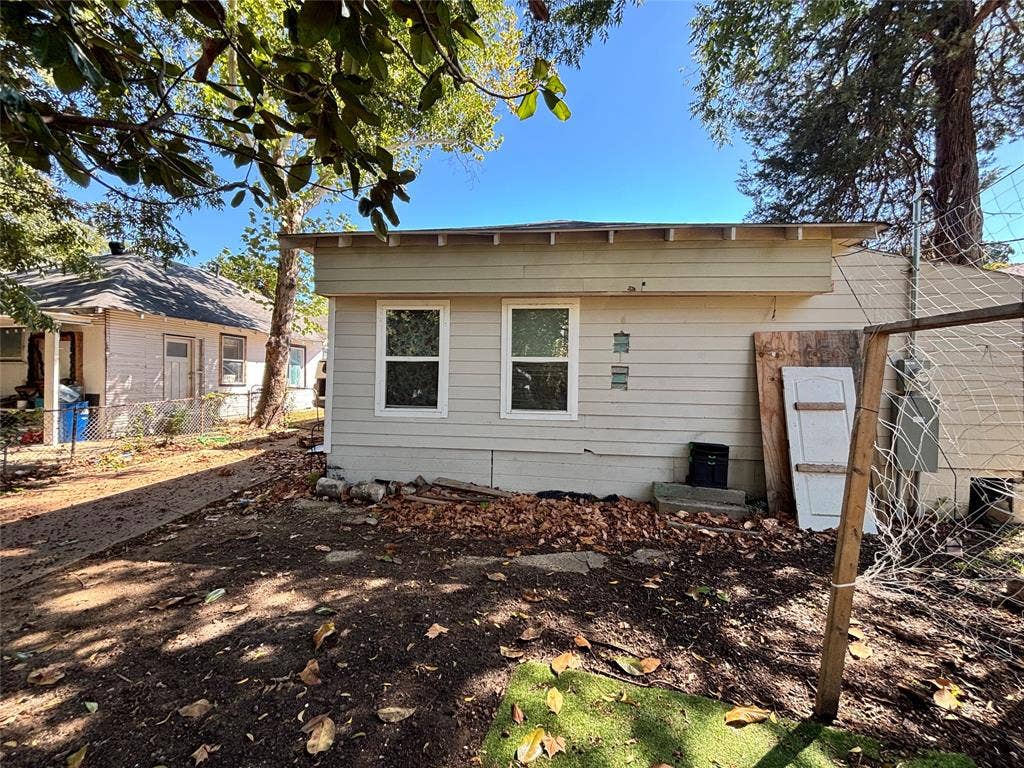 2917 Lenway Street, Dallas, TX 75215 Horizontal siding exterior with dual windows and overhanging eaves