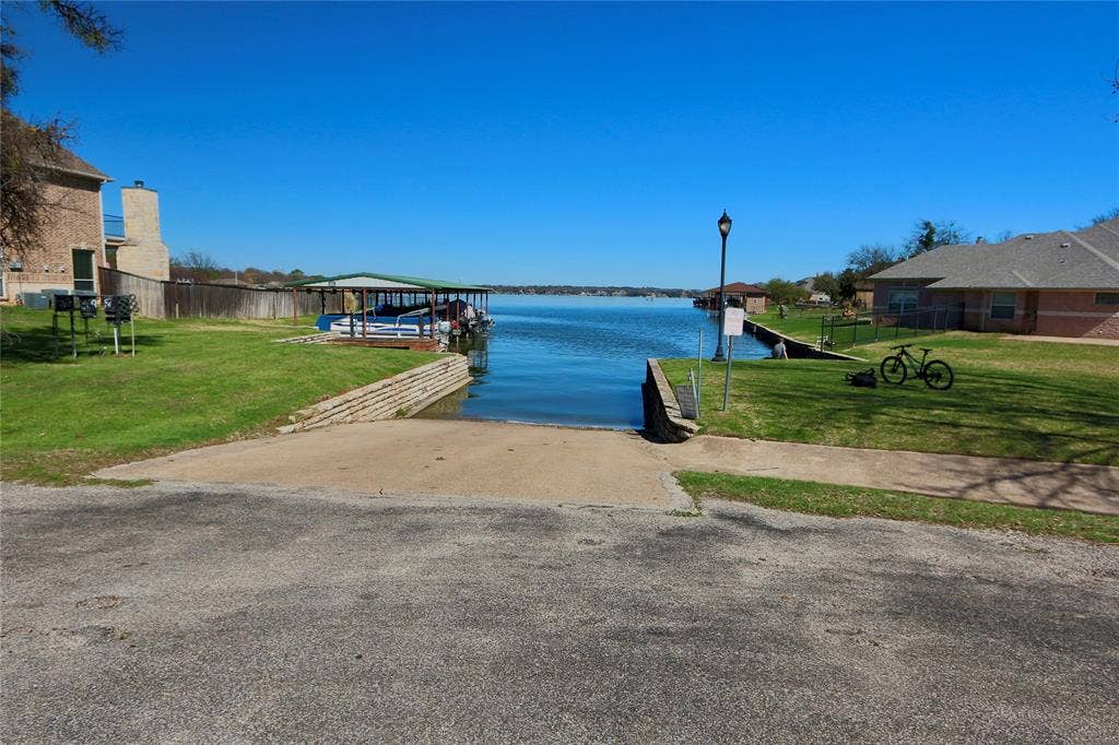 3714 Cove Timber Avenue, Granbury, TX 76049 Launch your watercraft in minutes as this is only feet from your driveway.