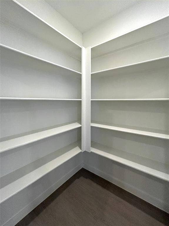 2504 Clyde Road, Celina, TX 75009 Storage space featuring white built-in wrap-around shelving and luxury vinyl plank flooring
