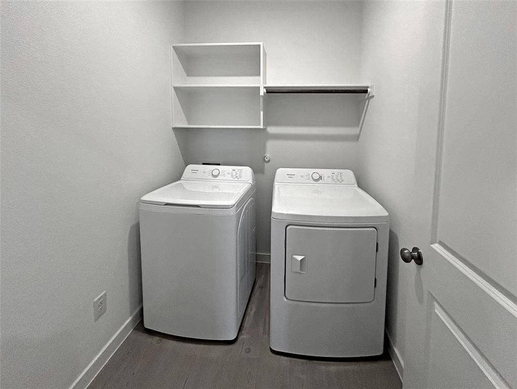 2504 Clyde Road, Celina, TX 75009 Laundry room features luxury vinyl plank flooring, built-in shelving, and a wall-mounted hanging rod