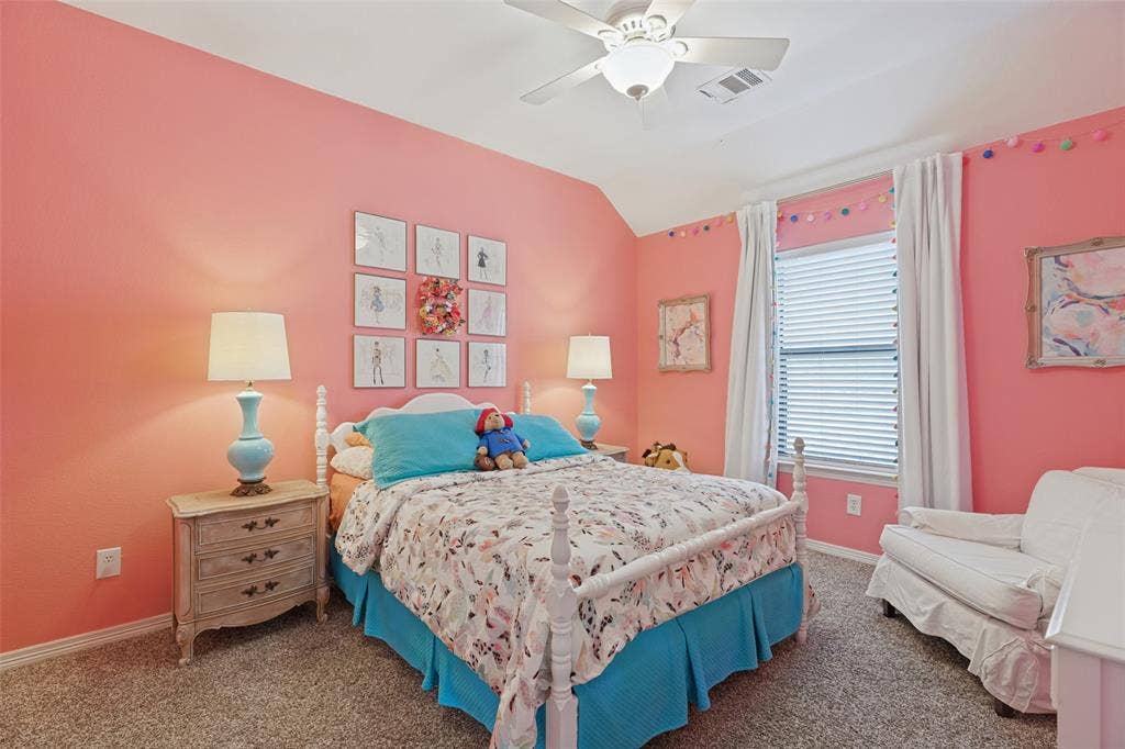 Bedroom featuring  carpeted flooring, and a central ceiling fan with integrated lighting