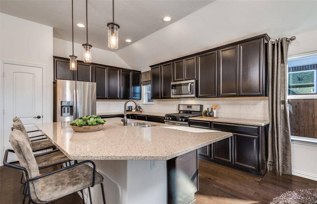2513 Marigot Street, Princeton, TX 75407 *Model Representation - Spacious kitchen with eat-in bartop island