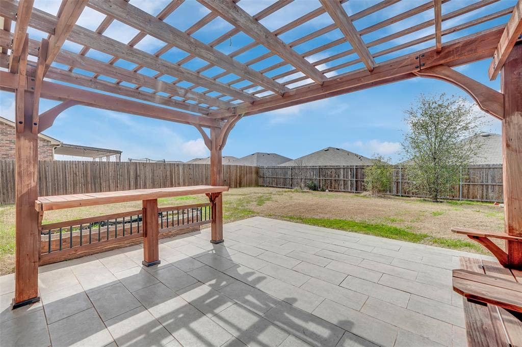1121 Basswood Lane, Royse City, TX 75189 View of patio / terrace featuring a fenced backyard and a pergola