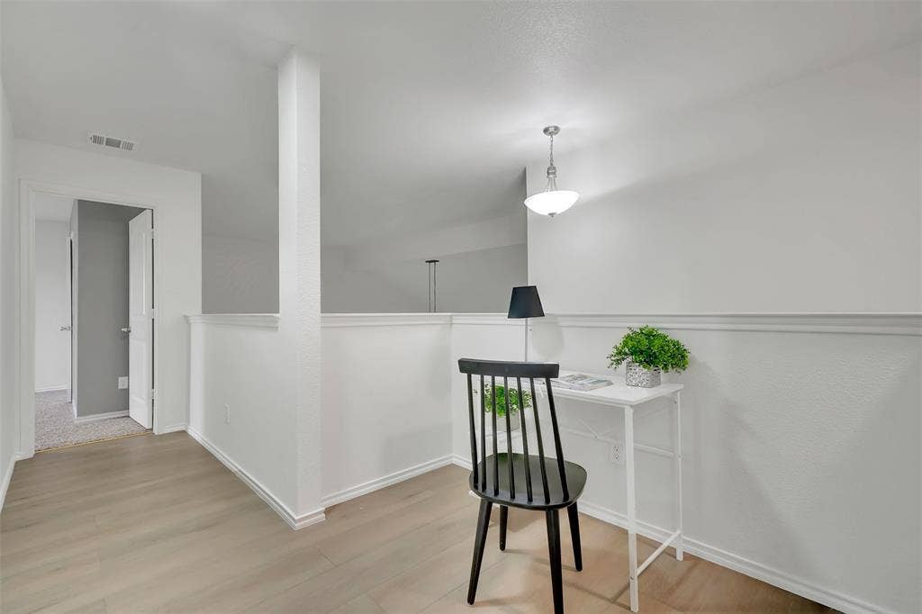 1121 Basswood Lane, Royse City, TX 75189 Office area with wood finished floors, visible vents, and baseboards