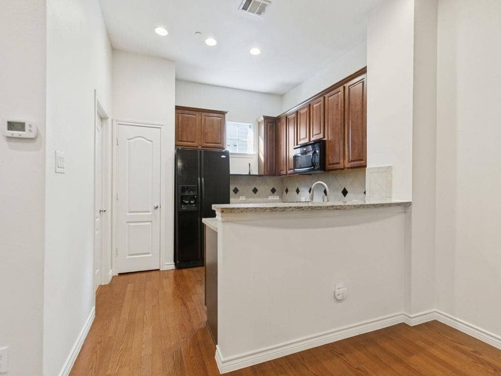 Kitchen with adjacent Laundry Room