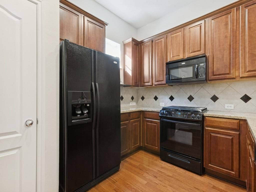 Kitchen with adjacent Laundry Room