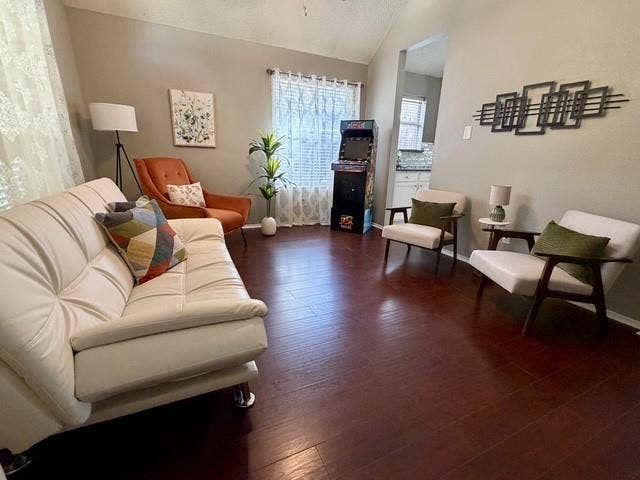 11159 Covey Lane, Frisco, TX 75035 Vaulted ceiling featuring wood-finish flooring and a multi-pane window