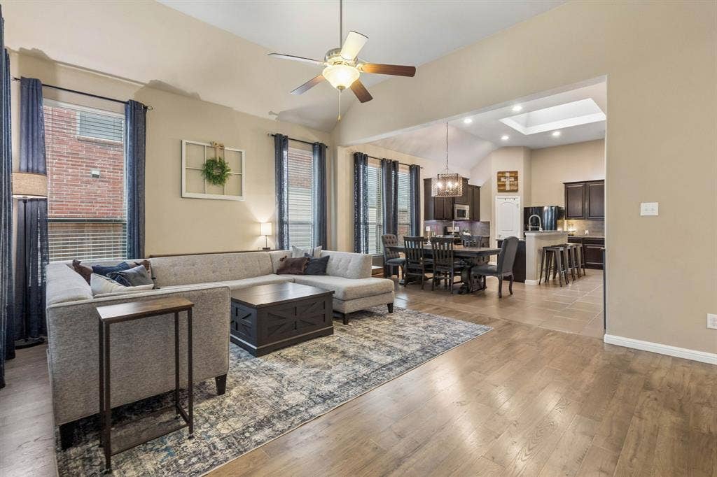 View of the living room showing the seamless flow throughout the home.