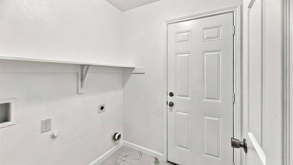 Private backyard featuring a wood privacy fence, concrete patio, grass lawn, and mature trees