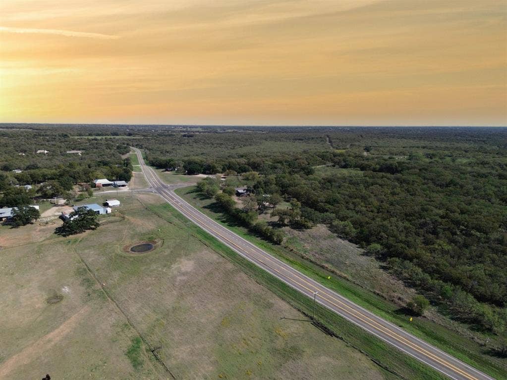 3907 Rogers Hill Road, Waco, TX 76705 Aerial perspective of expansive acreage featuring native vegetation, established trees, and natural terrain