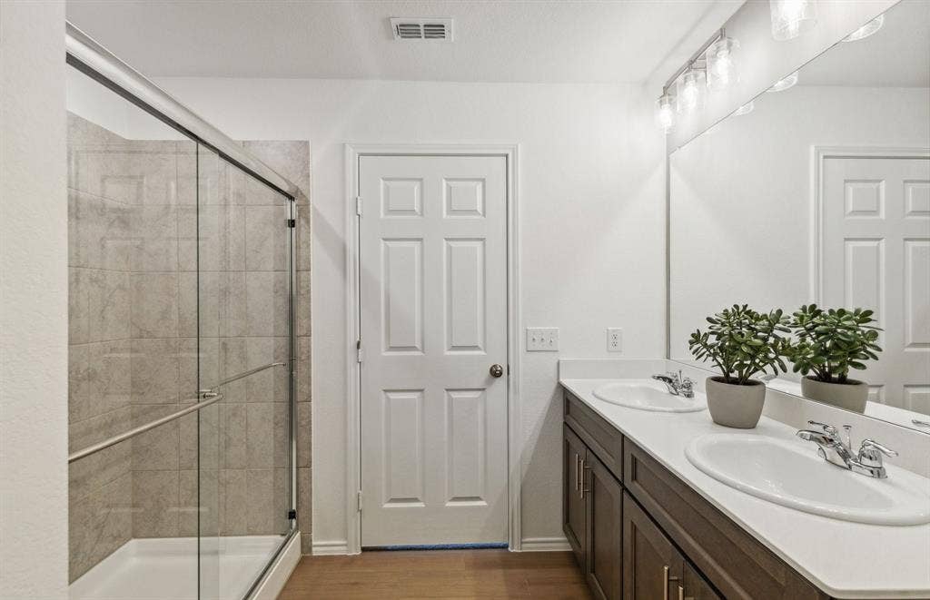 2452 Arbutus Drive, Forney, TX 75126 *Model Representation - Owner's private bath with double vanity