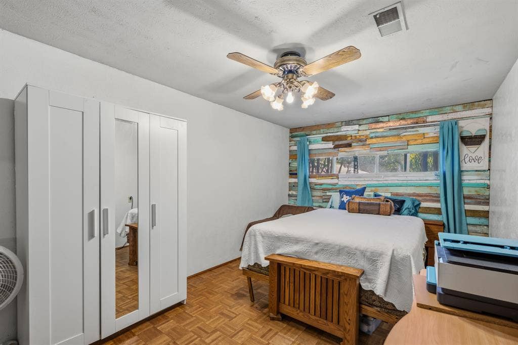 Bedroom with closet cabinet that will stay.