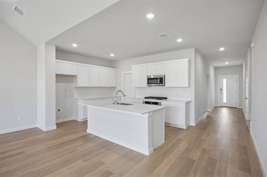 2118 Sunshining Road, Princeton, TX 75407 Kitchen in the Masters home plan – REPRESENTATIVE PHOTO