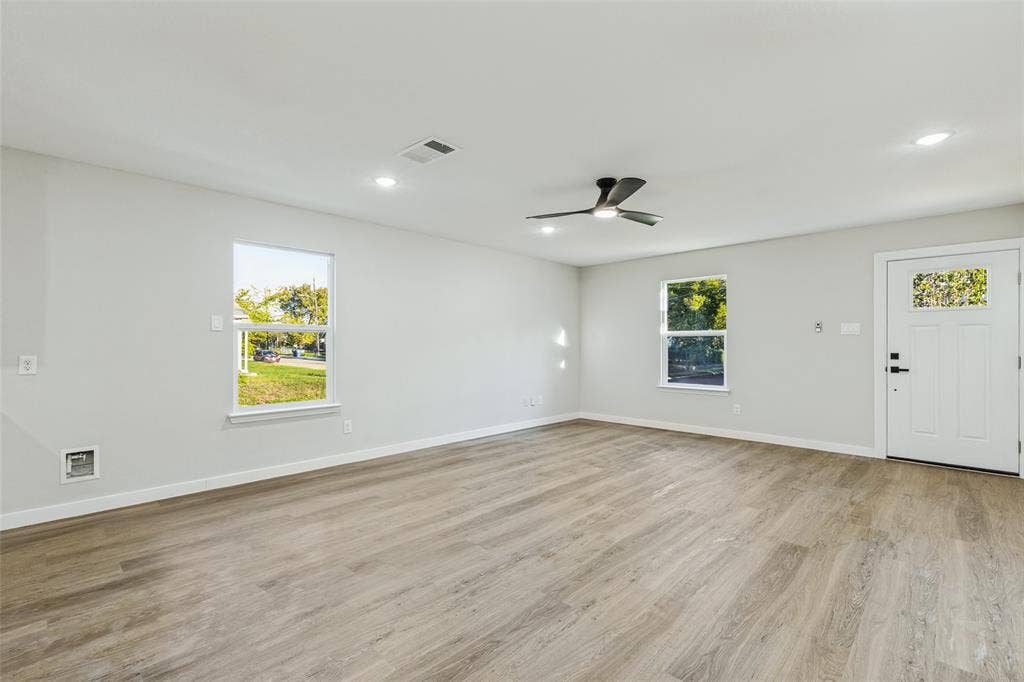 4603 Spring Garden Street, Dallas, TX 75215 Open floor plan living room with ceiling fan