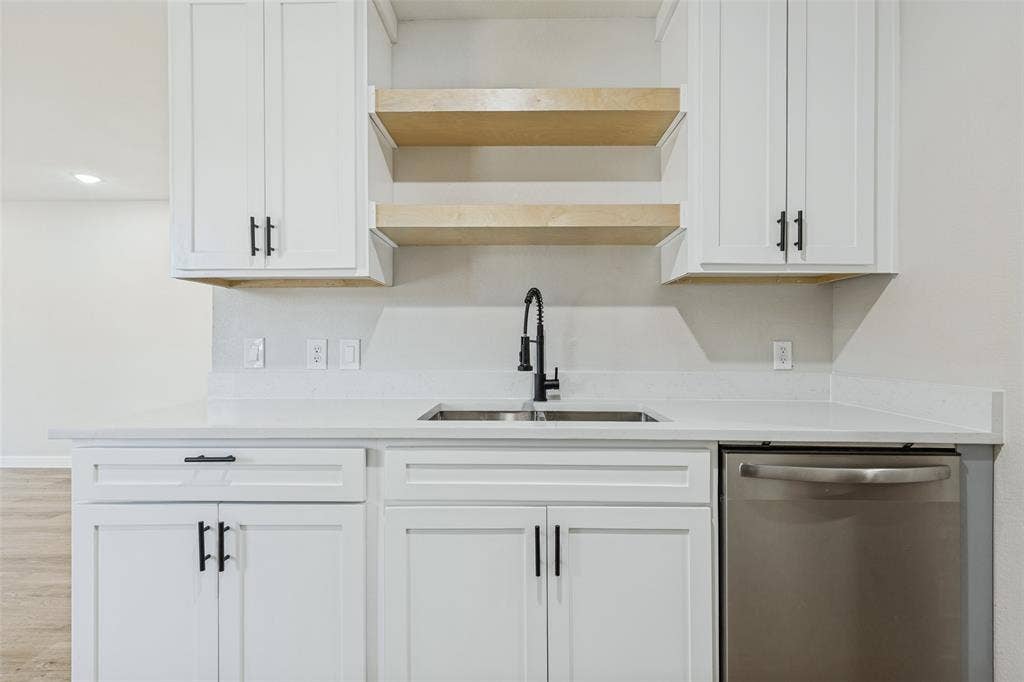 4603 Spring Garden Street, Dallas, TX 75215 Kitchen with stainless steel dishwasher.