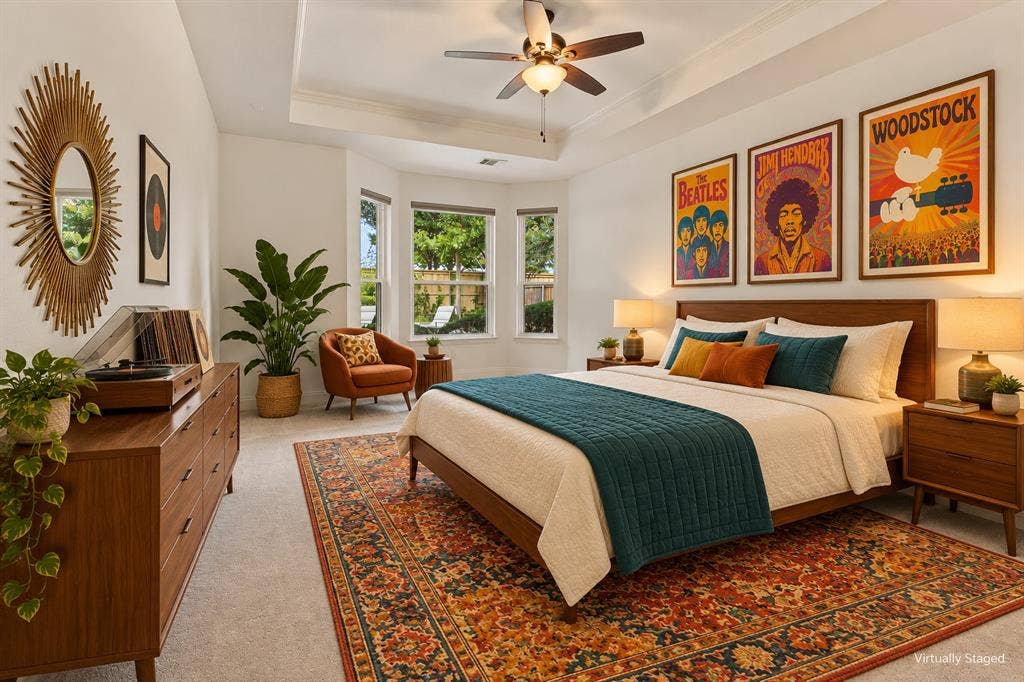 511 Clover Leaf Lane, McKinney, TX 75072 Tray ceiling with a central multi-blade ceiling fan and three-pane bay window