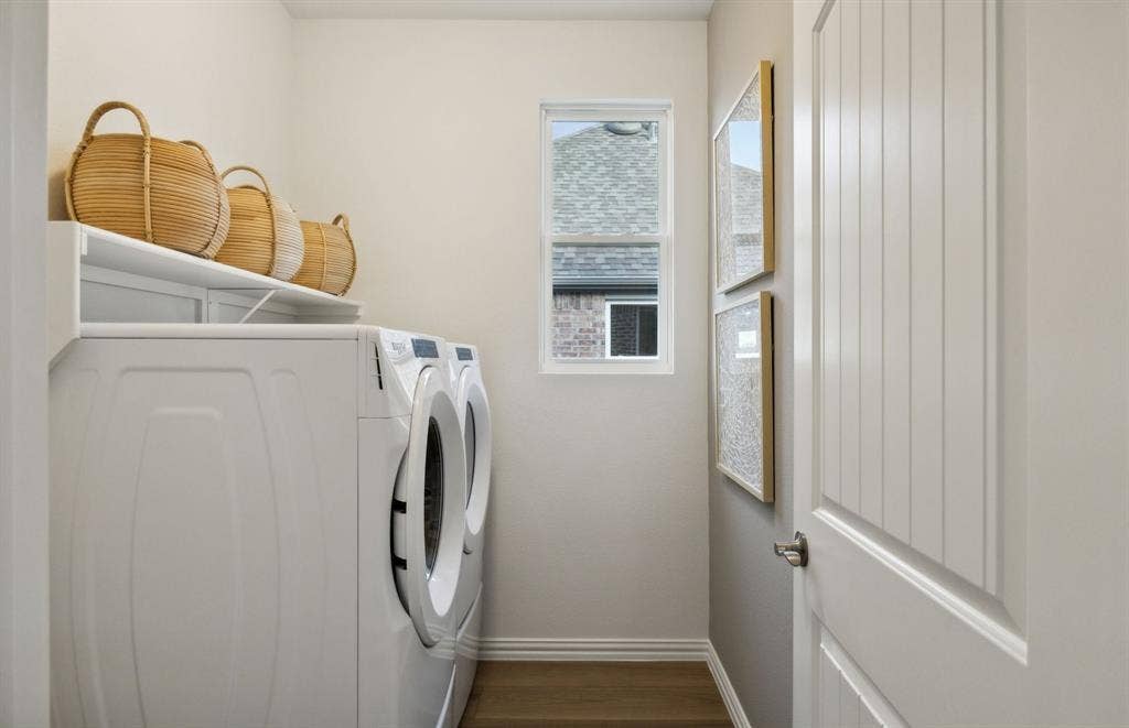 1433 Holmes Street, Celina, TX 75009 *Model Representation - Laundry room with storage space