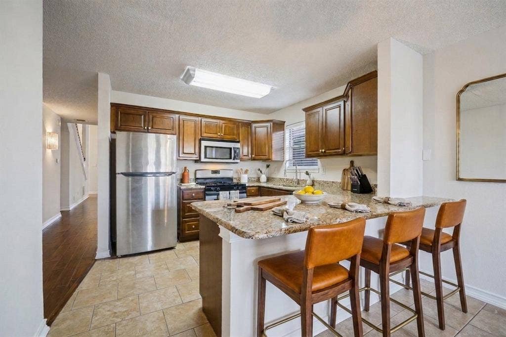 3115 Sara Drive, Rowlett, TX 75088 This picture has been virtually staged.