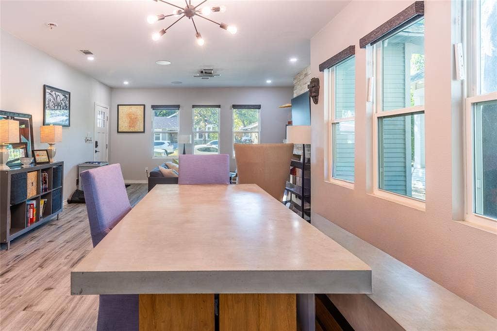 608 N Edgefield Avenue, Dallas, TX 75208 Rows of windows bring the outdoors in and connect with the Kings Highway neighborhood