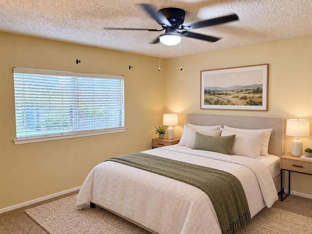 618 Pyramid Drive, Garland, TX 75040 Room featuring a matte black ceiling fan with an integrated light fixture, neutral wall color, and large horizontal window with slatted blinds