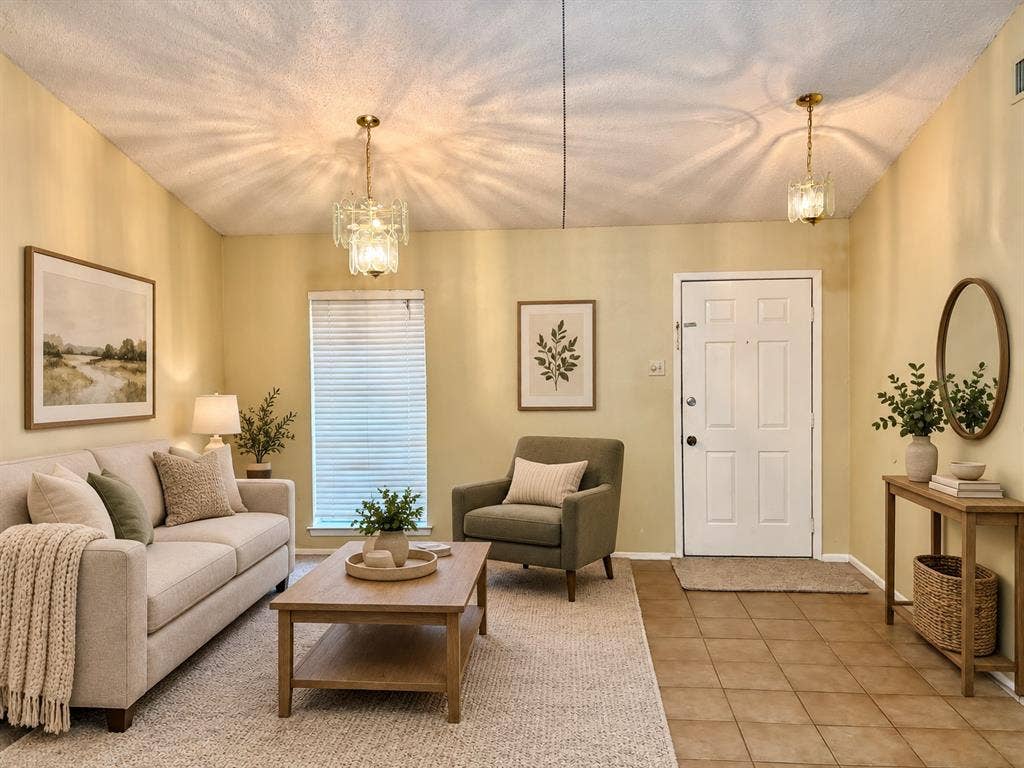 618 Pyramid Drive, Garland, TX 75040 Entry area featuring ceramic tile flooring, dual glass and gold-tone pendant lighting, and a six-panel exterior door