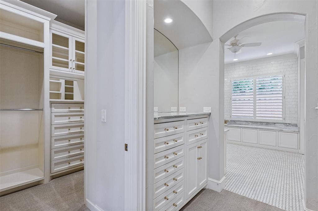 6467 Orchid Lane, Dallas, TX 75230 Custom and beautifully designed storage + view of "his" closet.