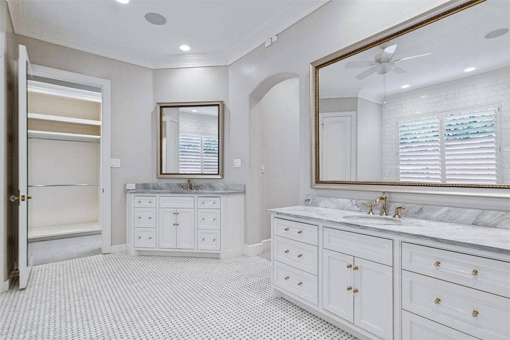 6467 Orchid Lane, Dallas, TX 75230 View of both vanities and entrance to "her" closet.