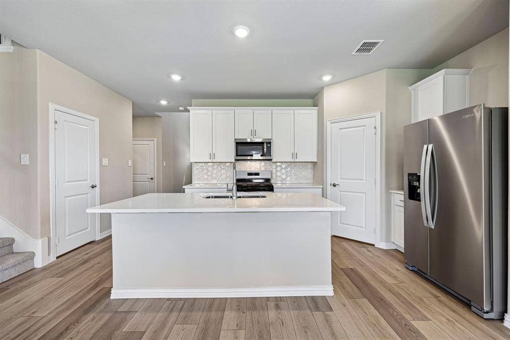 Photo is not of the actual home, but is an inspirational photo of builder’s model home and may depict options, furnishings, and/or decorator features that are not included.