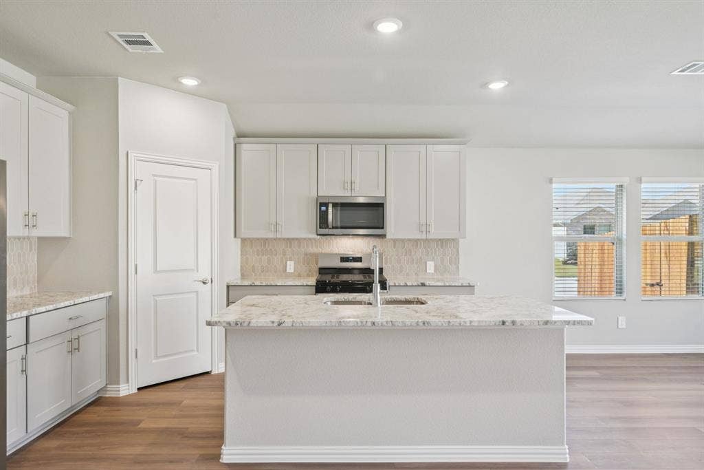 Photo is not of the actual home, but is an inspirational photo of builder’s model home and may depict options, furnishings, and/or decorator features that are not included.