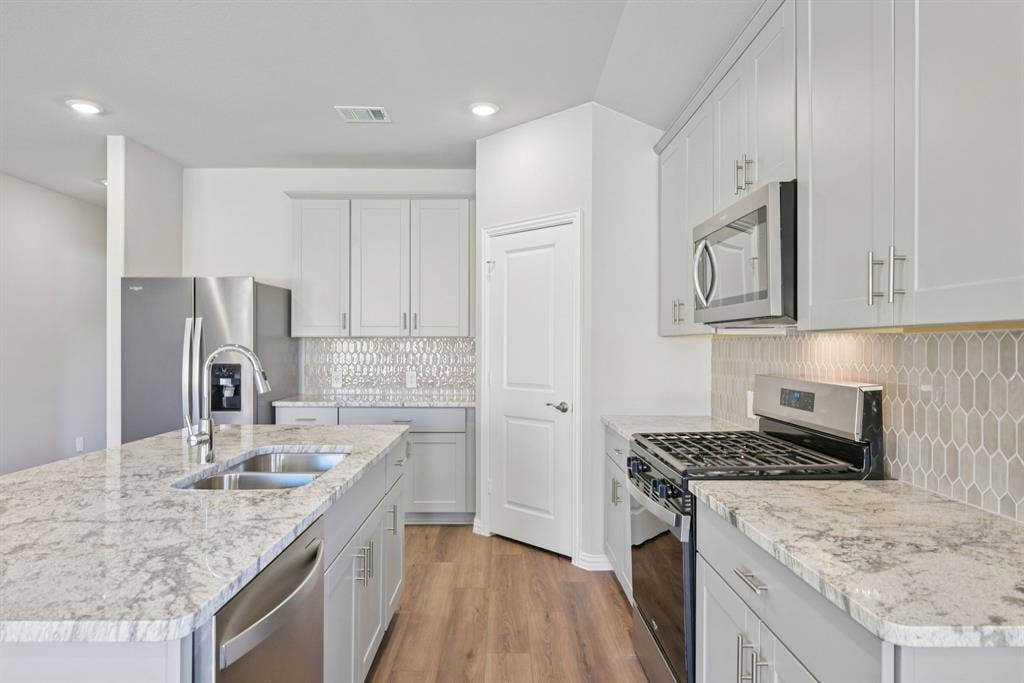 Photo is not of the actual home, but is an inspirational photo of builder’s model home and may depict options, furnishings, and/or decorator features that are not included.